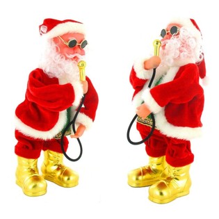 Pap&aacute; Noel cantando y bailando con micr&oacute;fono